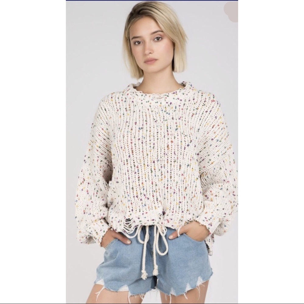 Knitted sweater with distressed Hem details - Picture 3 of 8